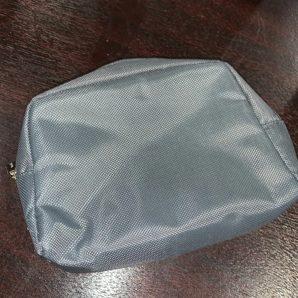 EUC TUMI gray toiletry bag